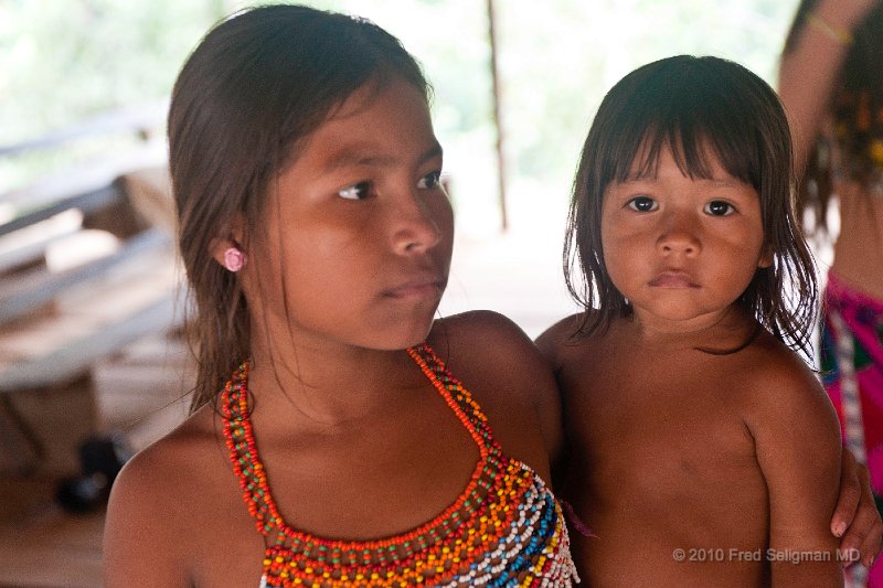 20101203_123557 D3.jpg - Young Embera girl holds infant